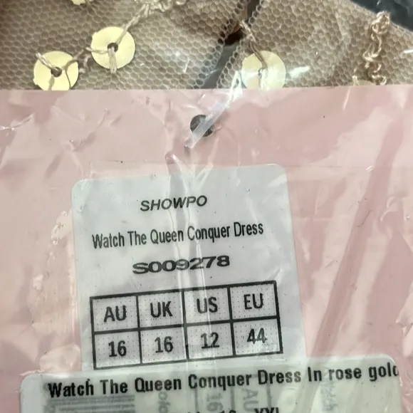 WATCH THE QUEEN CONQUER TULLE DRESS IN ROSE GOLD SEQUIN TULLE